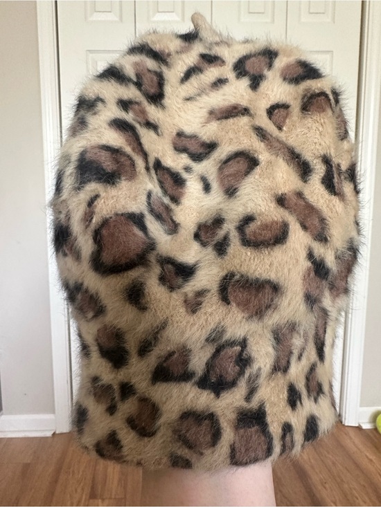 Charming Charlie Accessories - Charming Charlie Faux Fur Leopard Print hat. 
41% real Angora rabbit hair